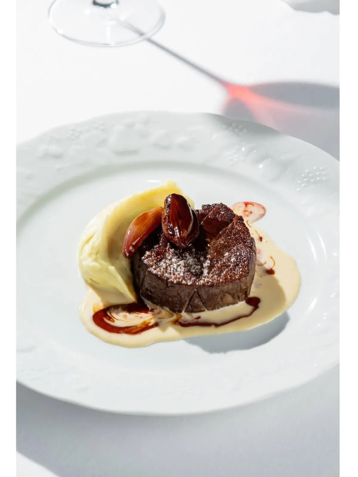 A plated main course by Chef Nikita Botberg